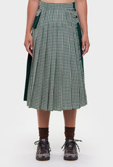 Shrimps Anya wool Kilt. Green gingham kilt with contrasting plain green on the back. Buckle fastenings with side pocket. Woven and made in Scotland. AW26