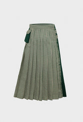 Shrimps Anya wool Kilt. Green gingham kilt with contrasting plain green on the back. Buckle fastenings with side pocket. Woven and made in Scotland. AW26