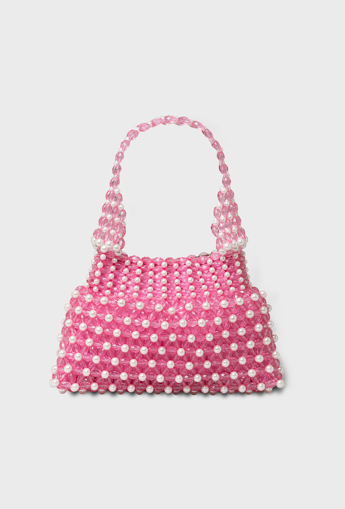pink mini handbag with cream pearls